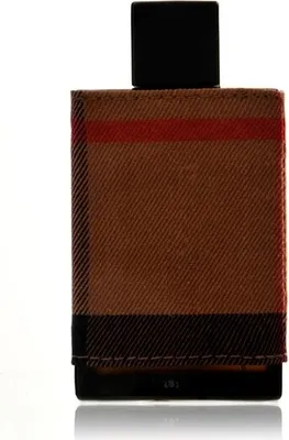 A close-up shot of a Burberry London for Men Eau de Toilette bottle.