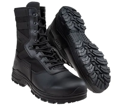 A pair of black tactical boots shown from a diagonal angle against a white background.