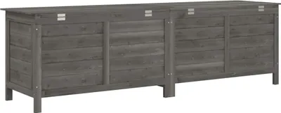 A long, gray wooden storage chest with two lids.