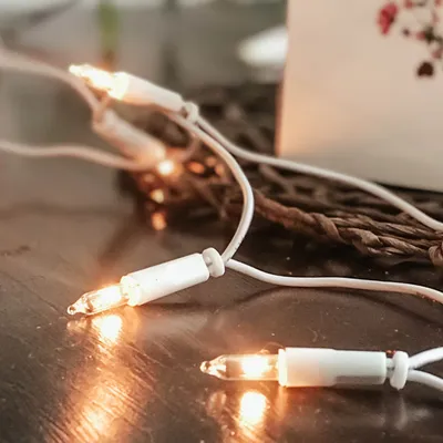 Produktbild von Lichterkette innen 50 klare warme Lichter, beleuchtet 7,35m, Kabel weiß, Stecker