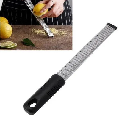 Immagine prodotto di Grattugia in acciaio per formaggio e agrumi - Grattugia per limoni - Grattugia per alimenti - Grande