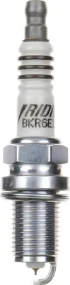 A close-up studio shot of a single spark plug.