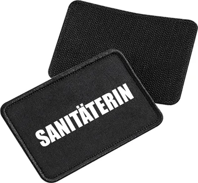 Produktbild von Huuraa Patch Sanitäterin Schriftzug Black 10 x 6,5cm Baumwolle Klettpatch für Mütze Geschenkidee