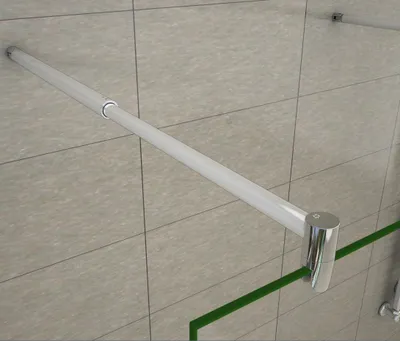 A close-up view of a shower enclosure's support bar and glass panel.