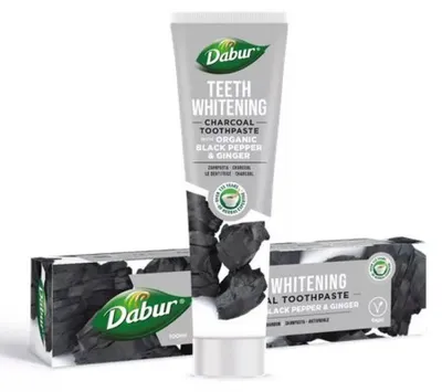 Produktbild von FLUORIDFREIE ZAHNPASTE MIT KOHLE, PFEFFER UND INGWER ZUR ZAHNAUFHELLUNG 100 ml – DABUR