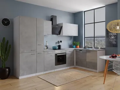 A modern kitchen setup with concrete-look cabinets and a large window.