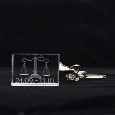 Produktbild von Glasschlüsselanhänger Sternzeichen Waage 3x2cm