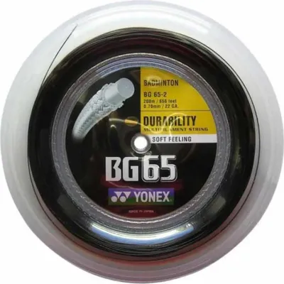 A spool of black badminton string with a yellow label.