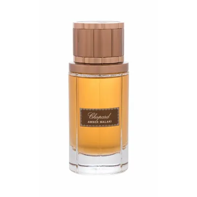 A bottle of Chopard Amber Malaki perfume against a white background.