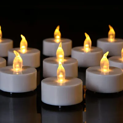 Produktbild von Flammenlose LED-Kerzen - 50 Stück - Flackernd Warm Gelb - Sicher für Zuhause und Draußen
