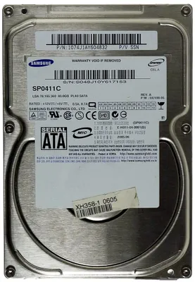 A top-down view of a Samsung hard disk drive with a label showing its specifications.