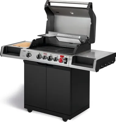 A studio shot of a gas grill on a white background.