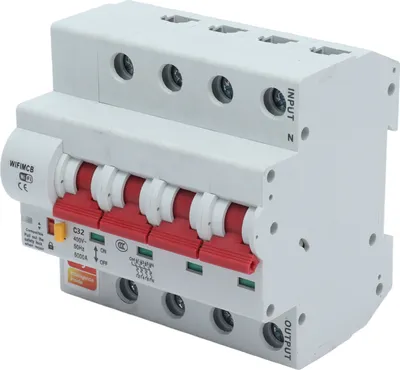 A white electrical circuit breaker with red switches.