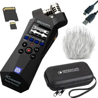 A collection of items including a Zoom H1essential Handy Recorder, SD cards, USB cables, a furry microphone windscreen, and a carrying case.