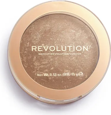 A close-up, top-down view of a round bronzer compact.