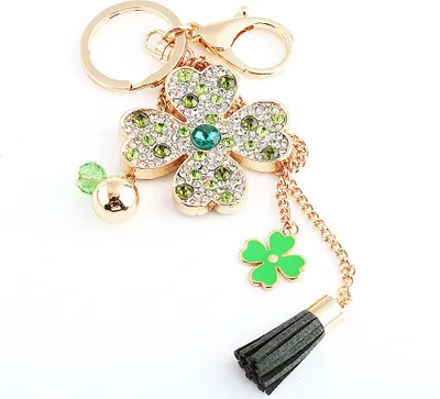 Immagine prodotto di Portachiavi cristallo quadrifoglio, a quattro foglie e verde, con nappina per donna, borsa e auto