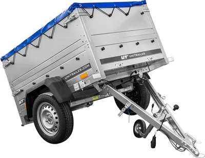 A silver utility trailer with a blue tarp cover, shown at an angle against a white background.