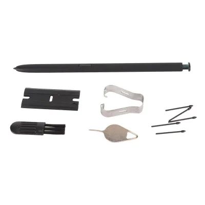 A collection of electronic repair tools and a stylus are laid out on a white background.