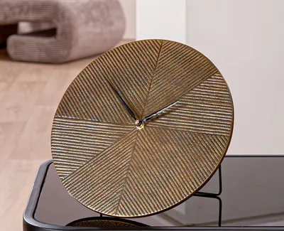 Immagine prodotto di Gilde Stand-/ Tischuhr, rund, "Rapa", Aluminium, bronzefarben, VE 2, L. 15.5 cm, D. 25.5 cm 53373 4063387533734