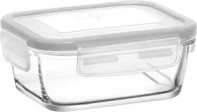 A clear glass food storage container with a gray lid and white label.