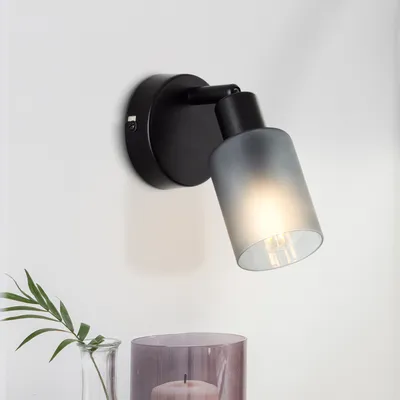 Produktbild von BRILLIANT schwarzer zeitloser Wandspot Loralie | schwarz/rauchglas | Metall/Glas | schwenkbarer Kopf | bei geeignetem Leuchtmittel dimmbar | 1x E14 max. 40 W