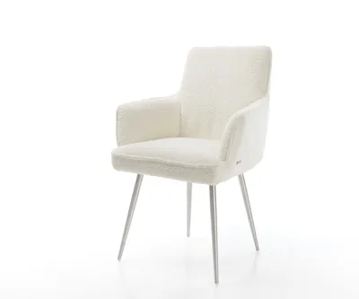 A white armchair with silver legs against a white background.
