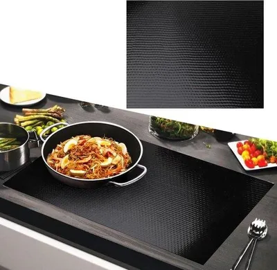 Image de Tapis de protection pour plaque à induction 52 x 78 cm, silicone noir