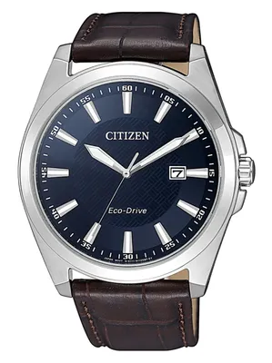 A close-up studio shot of a Citizen men's watch with a blue dial and a brown leather strap.