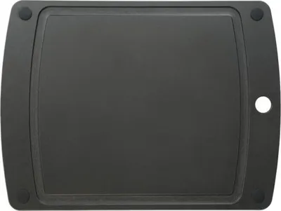 A top-down view of a black cutting board.