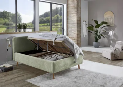 Produktbild von Meise Möbel Stauraumbett Mattis 140x200 cm | Doppelbett | Bettkasten & Lattenrost (Federholzrahmen) | Strukturstoff Hellgrün | Holzfuß eichefarbig