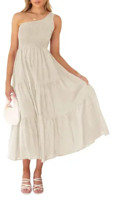 Immagine prodotto di ZESICA, abbigliamento da donna, collezione primavera/estate 2023. Vestito bohémien con stampa floreale, con una spalla scoperta, senza maniche e con drappeggio sul busto
