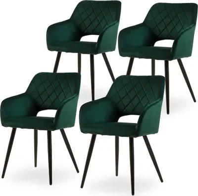 Four green velvet dining chairs with diamond tufting and black legs are arranged on a white background.