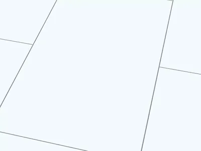 A close-up, angled view of a white laminate flooring tile with subtle grey lines indicating grout or seams.