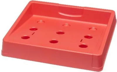 A red plastic tray with circular indentations.