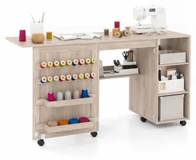 Immagine prodotto di COSTWAY - Tavolo pieghevole 2 in 1 per macchina da cucire, tavolo per macchina da cucire con ripiani, 18 ganci e contenitori, tavolo da cucito con rotelle, colore naturale
