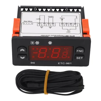 A digital temperature controller with a connected temperature probe.