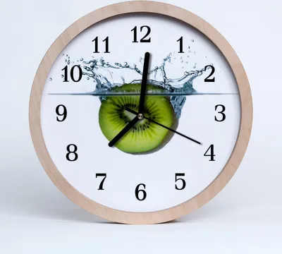 Produktbild von Holzuhr 20fi cm wanduhr - Kiwi