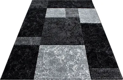 Produktbild von Kurzflor Teppich Wohnzimmer Schwarz 140x200 Rechteck Kariertes Design aus Polypropylen