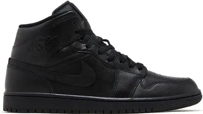 A studio shot of a black Nike Air Jordan 1 Mid sneaker.