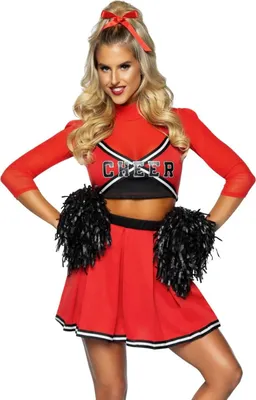 A woman in a cheerleader costume posing.