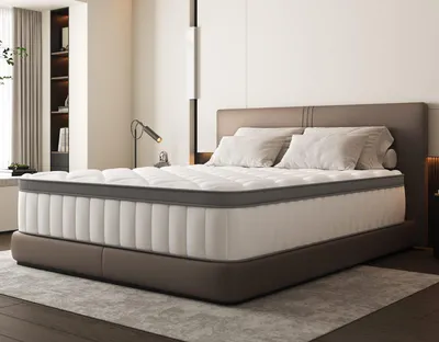 A mattress on a bed frame in a bedroom setting.