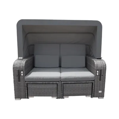 A grey outdoor sofa with a canopy, presented against a white background.