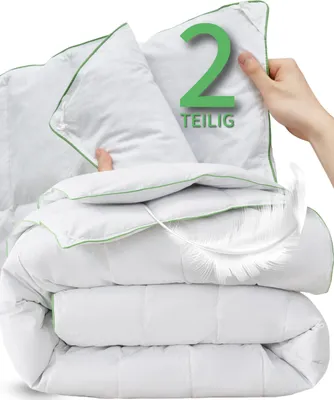 A stack of white duvets with green trim, with a hand holding one of them and a large green number '2' and text 'TEILIG' overlaid.