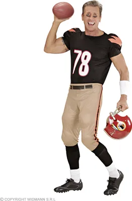 A man dressed in an American football costume, holding a football and a helmet.