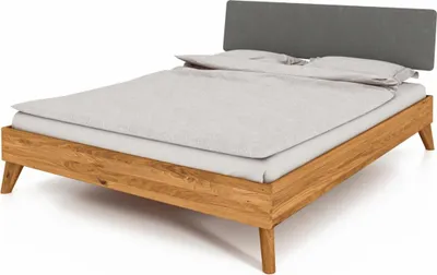 Produktbild von Bett Gerg 4 Sonderlänge 120x190 Wildeiche massiv Polsterkopfteil Grau Holzbeine