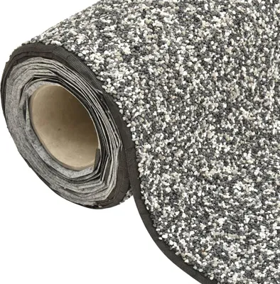 A close-up, rolled-up view of a gray and white speckled material, likely a carpet or mat, on a white background.