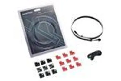 A collection of computer hardware accessories, including LED strips, cable management clips, and a clamp, laid out on a white background.