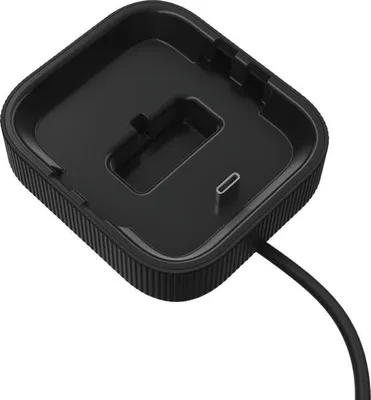 A black charging dock for a cordless device.