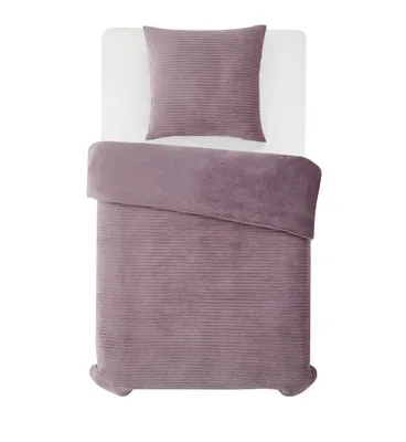 A duvet and pillow set laid out on a white surface.