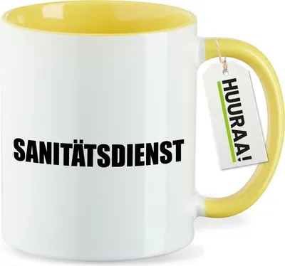 Produktbild von Huuraa Kaffeetasse Sanitätsdienst Schriftzug 330ml Gelb Keramik Kaffeebecher Geschenkidee